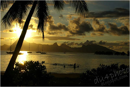 Local kid, sunset, Tahiti